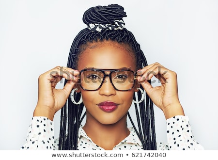 Foto stock: Portrait Of Young Woman With Braid Hairdo