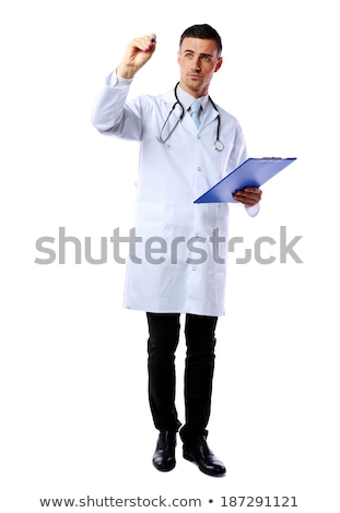 Сток-фото: Man Doctor Writing With Pen At Copyspace And Holding Clipboard Over White Background