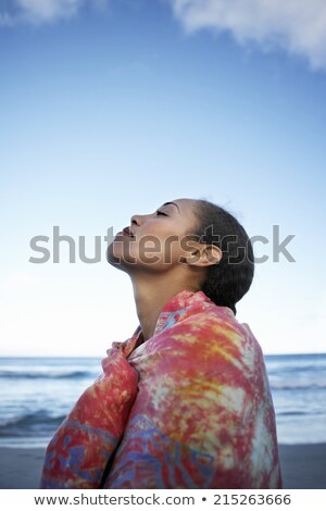 Stockfoto: Low Angle View Of Woman With Eyes Closed