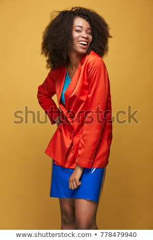 ストックフォト: Attractive Girl Hair In Red Latex Jacket