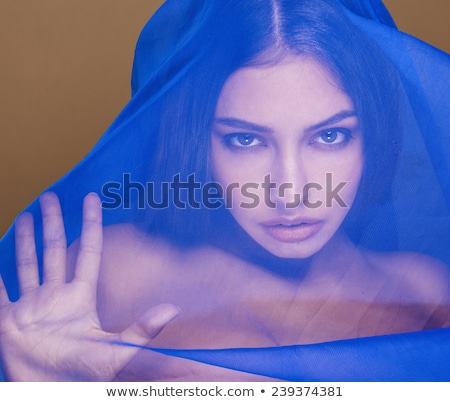 Foto stock: Beauty Young Islamic Woman Under Veil Blue Hijab On Face Close Up