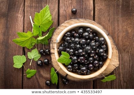 Zdjęcia stock: Black Currant On A Wooden Table
