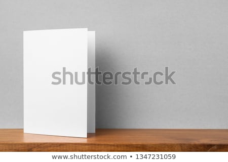 Foto d'archivio: Business Card On The Gray Wooden Wall 3d Rendering