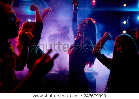 Foto stock: People In Night Club Dancing Man Woman Clubbing