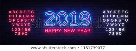 Stockfoto: Merry Christmas And Happy New Year Neon Sign