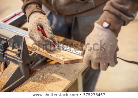 Zdjęcia stock: Worker Measuring Plywood