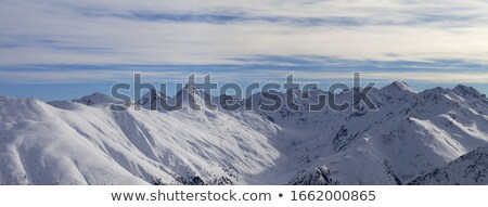 Winter Sunlit Mountains And Sky With Clouds Сток-фото © Lizard