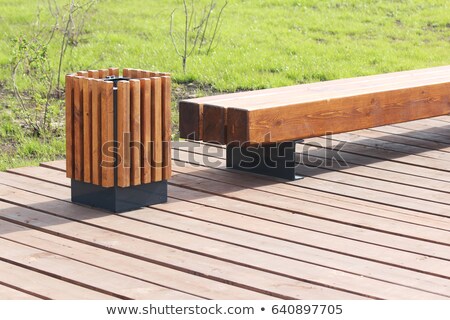 Stockfoto: Square Green Garbage Can In A Park