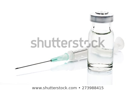 Stock fotó: Syringe With Bottle Closeup