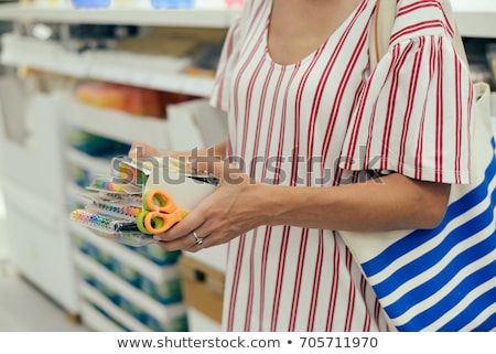 Stok fotoğraf: Little Girl Choosing Supplies For First Day In School