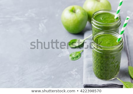 Foto stock: Spinach Smoothie Healthy Drink In Glass Jar On Grey Stone Background Copy Space