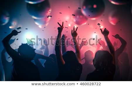 Stockfoto: Happy Young Woman Dancing At Night Club Disco