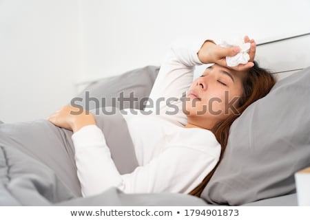 Stockfoto: Sad Woman Lying In Bed Insonia Suffer