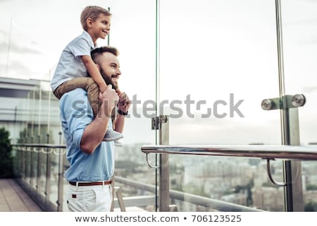 Foto stock: Happy Father Spending Time With His Little Son At The Park
