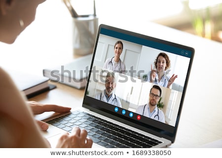 Zdjęcia stock: Team Of Professional Doctors Having Video Conference