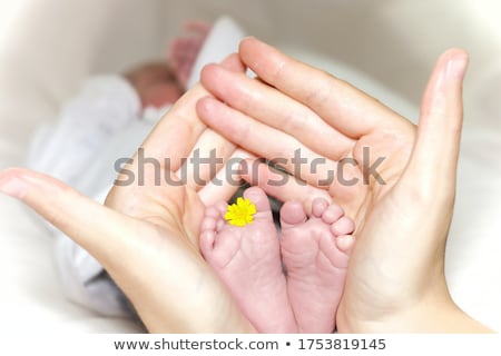 Stock photo: Cute Baby With Beautiful Blue Eyes