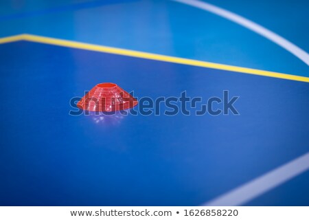 Foto stock: Soccer Indoor Marker On Pitch Sideline Yellow Soccer Cone Marker