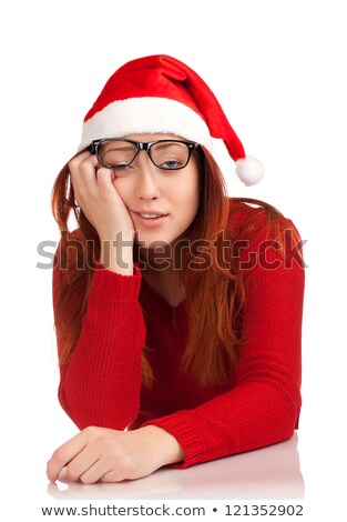 Smiling Redhead Young Woman With Santas Hat Stockfoto © Vankad