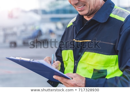 ストックフォト: Airport Staff Making Notes