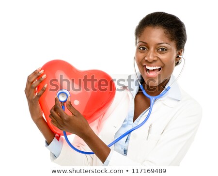 Stockfoto: Beautiful Female Surgeon Holding A Red Heart