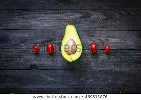 Сток-фото: Veggie Food Composition With Half Avocado Over A Darkdish