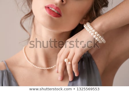 Stockfoto: Young Beautiful Woman With Pearl Necklace