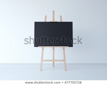 Stok fotoğraf: Easel And Blank Black Canvas In Bright Interior 3d Rendering