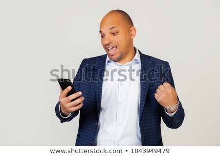 Foto stock: Screaming Happy Business Man Using Smartphone And Rejoices