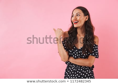 Zdjęcia stock: Asian Woman Posing Over Pink Background Pointing