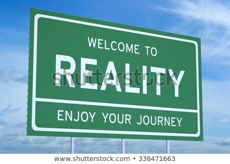 Stock foto: Green Road Sign - Welcome To Reality