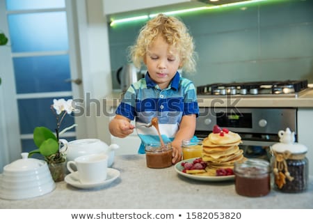 Stock photo: Children Eating Pancakes