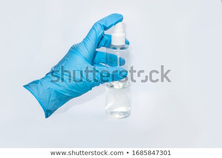 Stock fotó: Hands Of A Doctor In A Sterile Gloves And Drops Of Water
