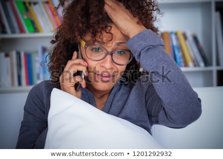 Stok fotoğraf: Young Woman Getting Bad News By Phone