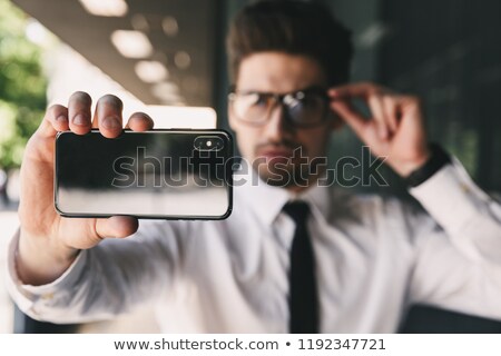 Stockfoto: Business Man Near Business Center Using Mobile Phone Take A Selfie