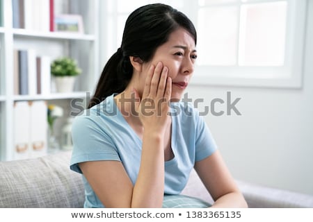 Foto stock: Young Woman Suffering From Toothache