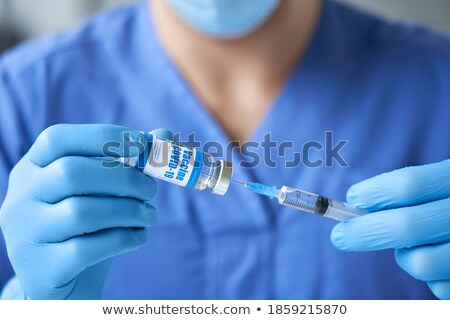 Stock fotó: Influenza Flu Vaccine Vials With Syringe