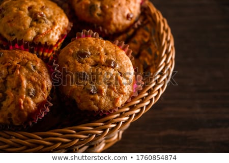 Stockfoto: Fresh Baked Cupcake On A Dark Wooden Background