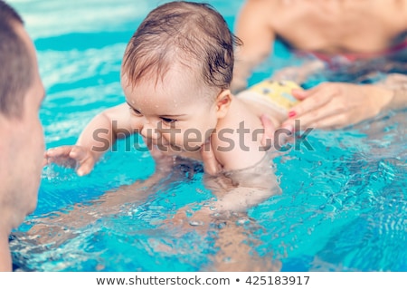 Stockfoto: Man Enjoying A Swim With His Son