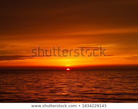 [[stock_photo]]: Coriscan Rocks In Sea At Dusk