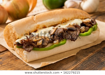 Foto stock: Rustic Steak Sandwich With Onions