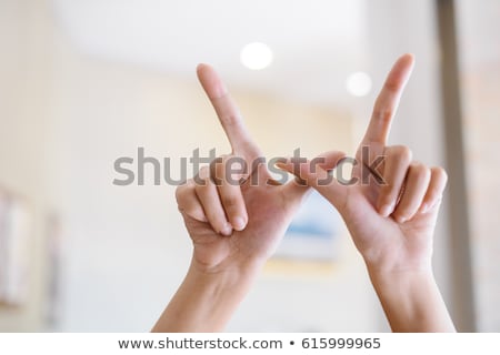 Stockfoto: Hand Demonstrating W In The Alphabet Of Signs