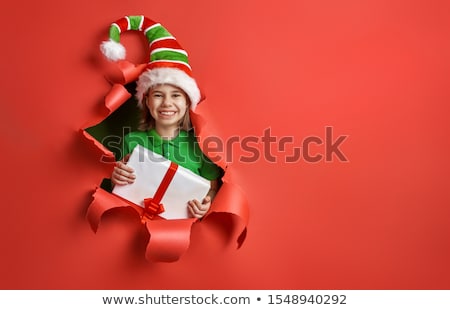 Foto d'archivio: Santas Elf On Bright Color Background