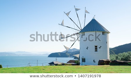 Foto stock: Windmill At Roadside