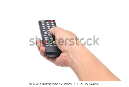 Stok fotoğraf: Hand Holding Remote And Changing Channel