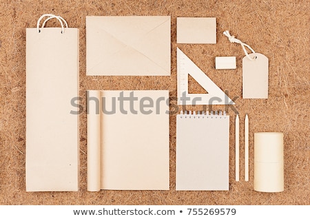 Foto stock: Eco Blank Packaging Stationery Gifts Template Of Kraft Paper On Brown Coconut Fiber Background