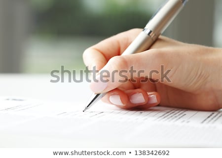 Foto stock: Businesswoman Filling Form