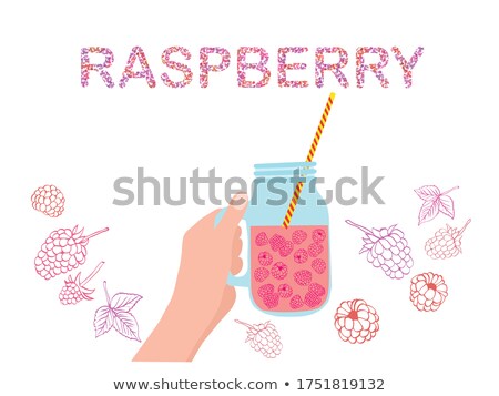 Foto d'archivio: Hand Holding Mason Jar With Raspberry With Quote Of Paspberry