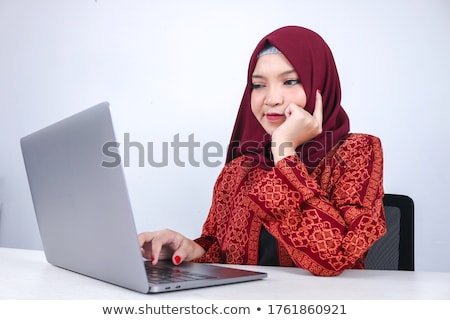 Stock foto: Young Asian Islam Woman Is Serious Look With Thinking Gesture Hand On Face On The Front Of Laptop