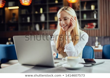 Zdjęcia stock: Young Smiling Business Woman With Laptop And Cellular