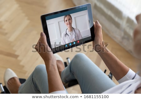 Сток-фото: Disability On The Display Of Medical Tablet